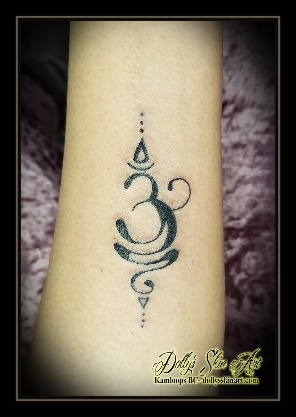 breathe tattoo symbol sanskrit indian thai ohm black tattoo kamloops dolly's skin art