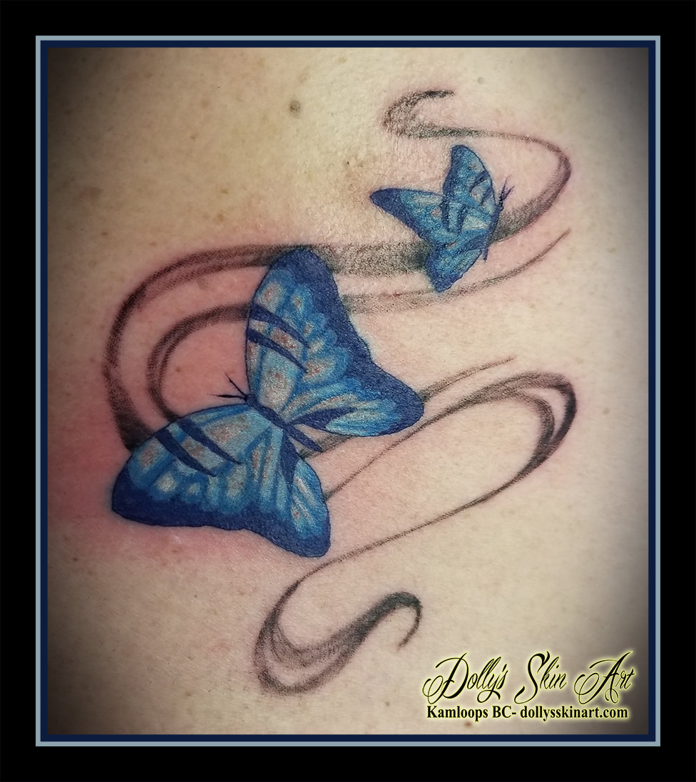 butterfly tattoo butterflies colour blue white black flying smoke swirl tattoo kamloops dolly's skin art