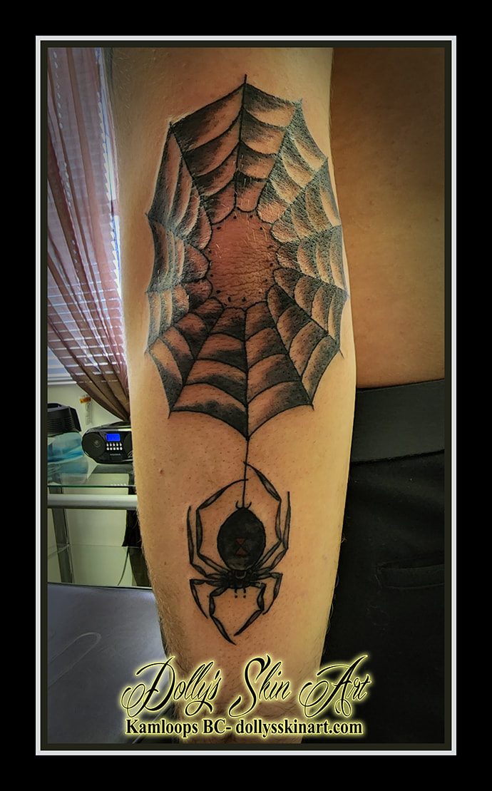 black widow tattoo spider web black and grey shading red elbow forearm tattoo dolly's skin art kamloops