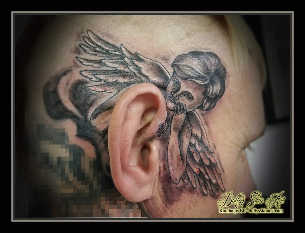 angel tattoo black and grey shaded above ear head cherub tattoo kamloops dolly's skin art