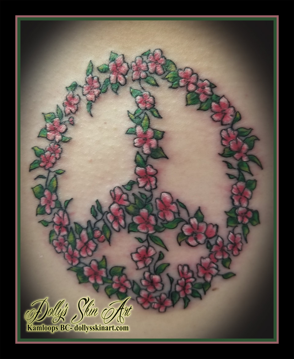 floral peace sign tattoo colour flowers pink green white tattoo kamloops dolly's skin art