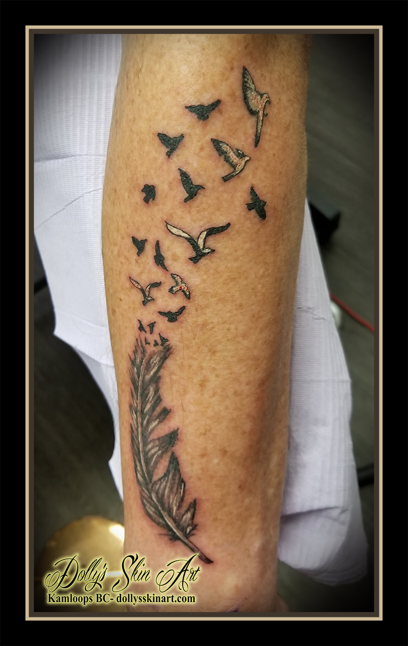 feather tattoo birds black and grey birds of a feather flock together black white grey forearm tattoo kamloops dolly's skin art