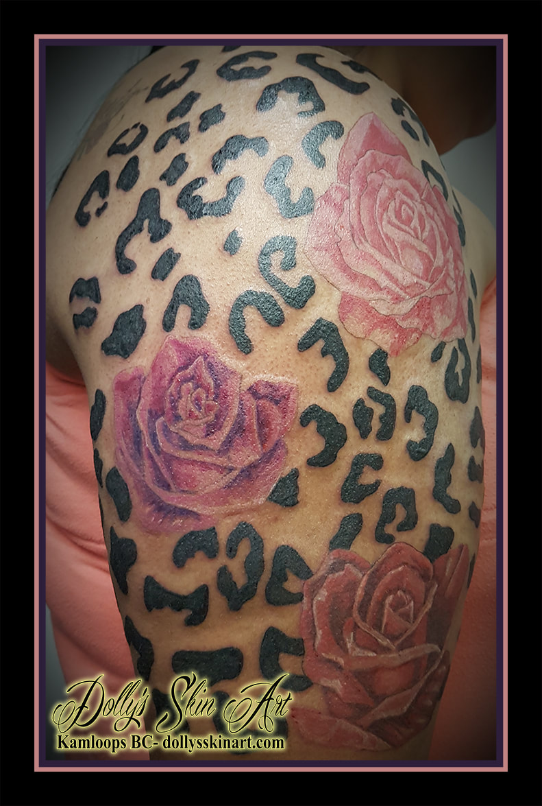 colour pink red roses leopard spots black arm tattoo kamloops dolly's skin art