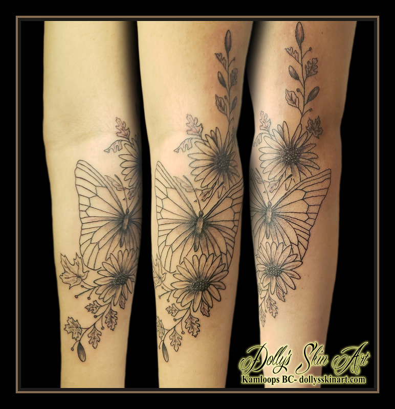 butterfly tattoo flowers leaves daisy black and grey shading linework forearm tattoo dolly's skin art kamloops