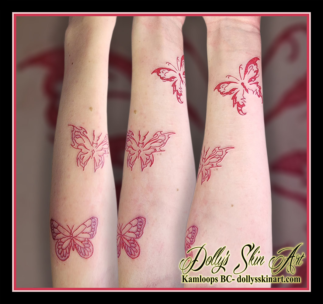 butterfly tattoo butterflies red arm colour tattoo kamloops dolly's skin art