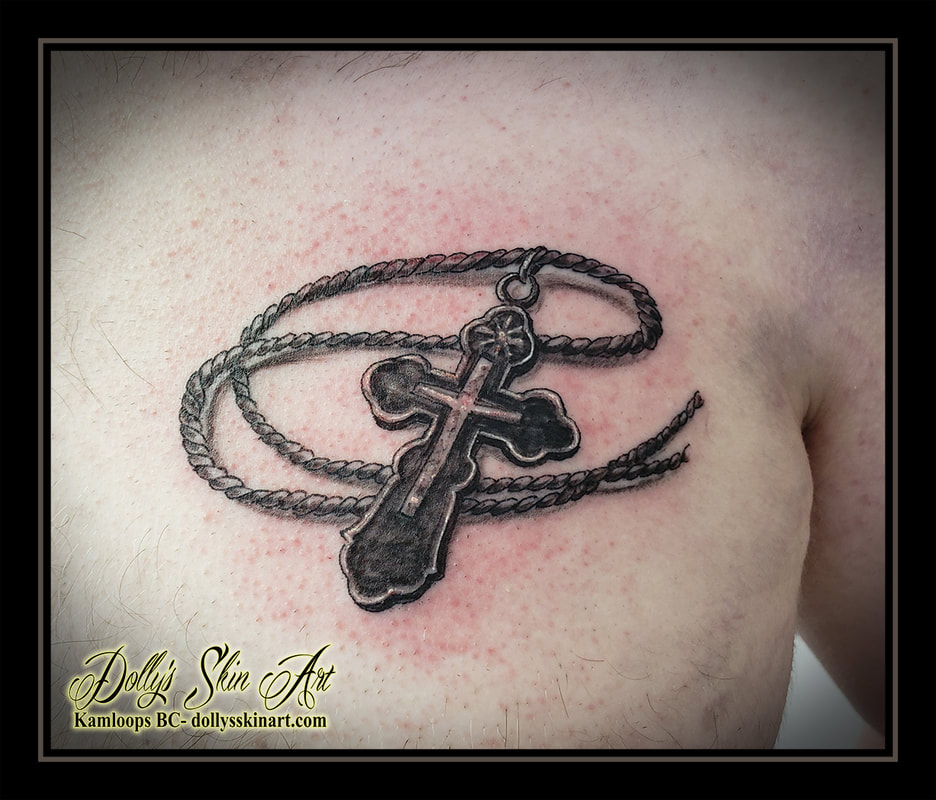 cross tattoo rope black and grey chest shading white tattoo kamloops dolly's skin art