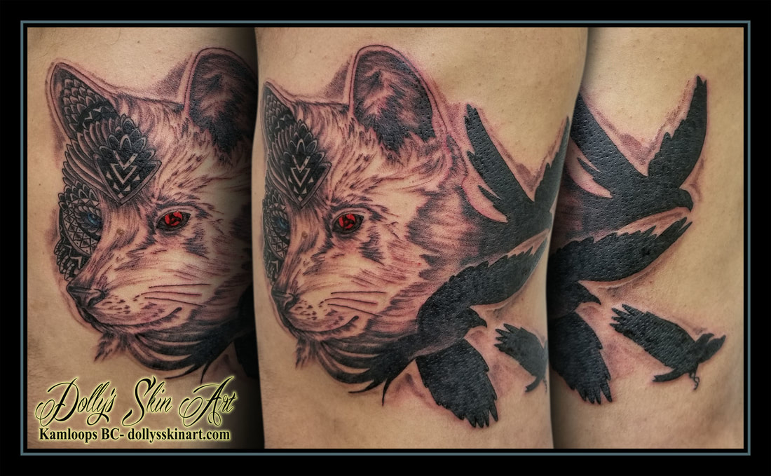 black and grey wolf mandala birds shading red blue eyes tattoo kamloops dolly's skin art