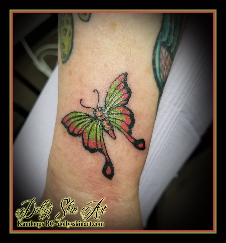 butterfly colour flash green red wrist traditional tattoo kamloops dolly's skin art
