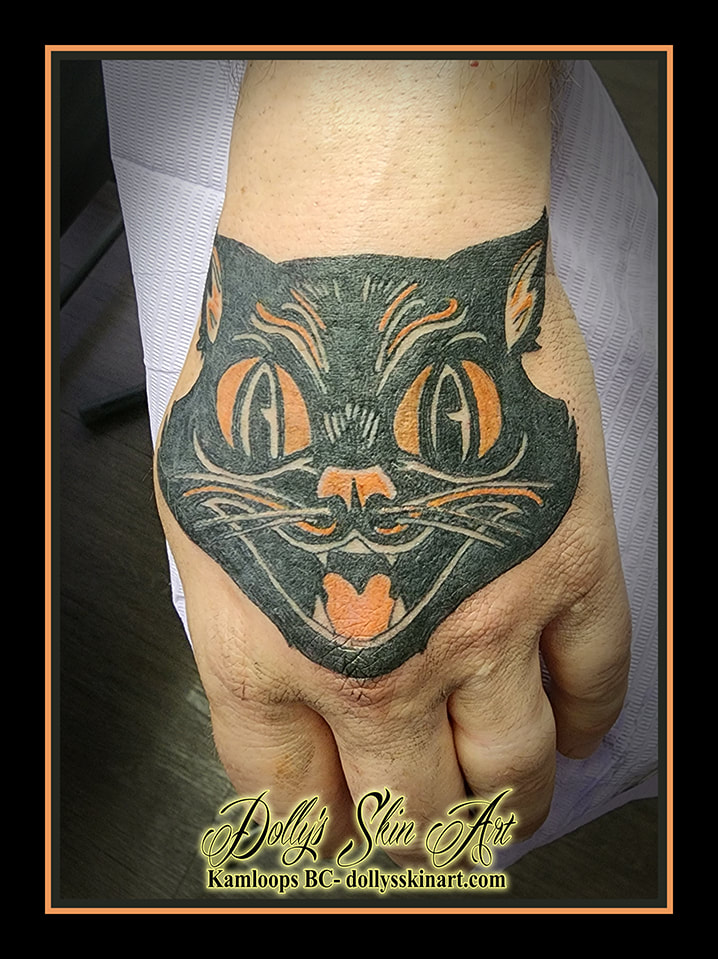 cat tattoo halloween traditional classic old school black cat orange hand decoration tattoo dolly's skin art kamloops