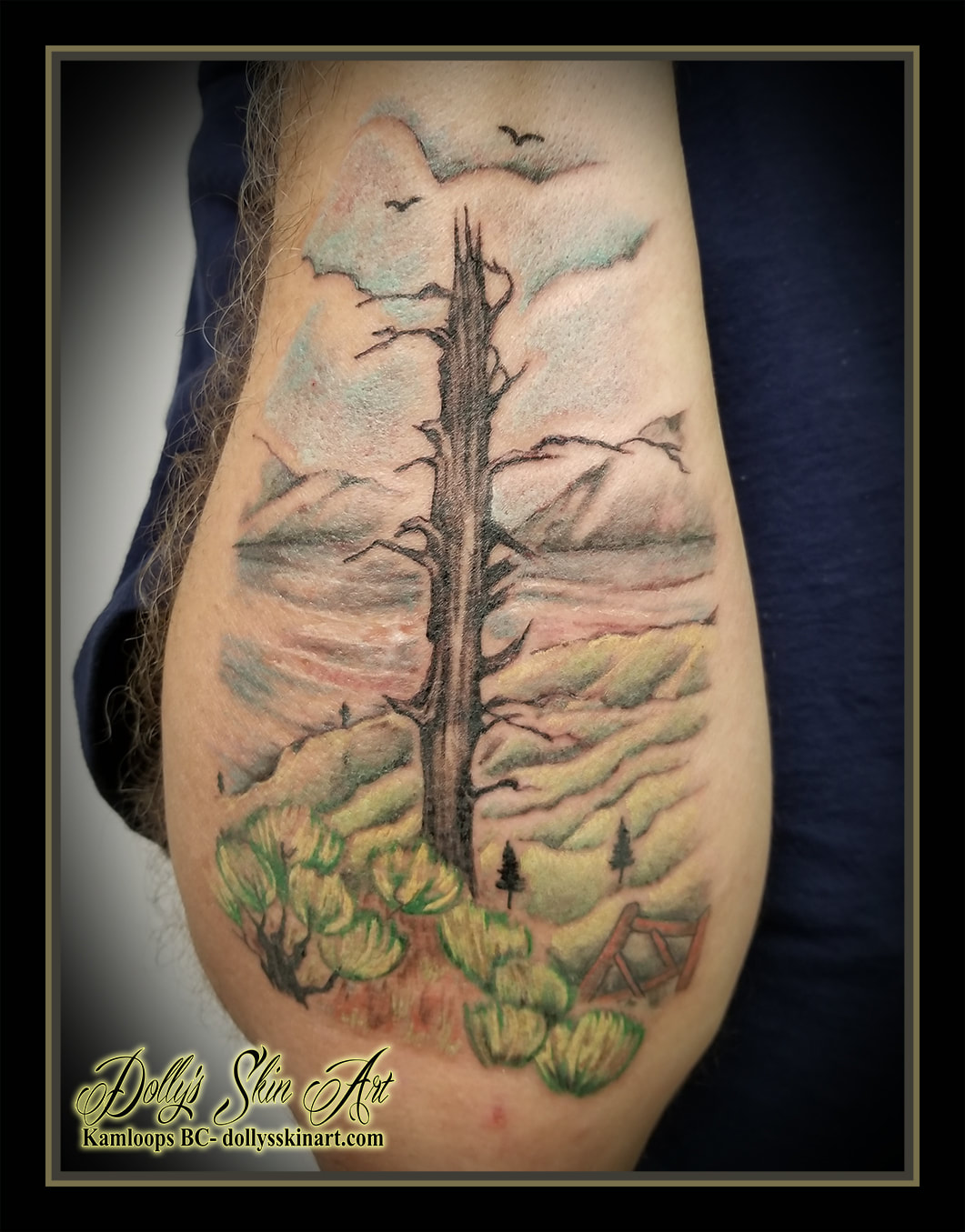 colour wildnerness scene tree lake shrubs hills fence kamloops lake tattoo kamloops tattoo dolly's skin art
