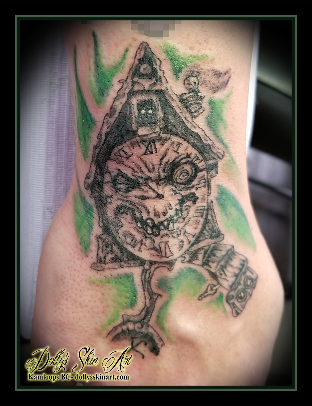 black and grey chaotic clock face green white hand wrist tattoo kamloops tattoo dolly's skin art
