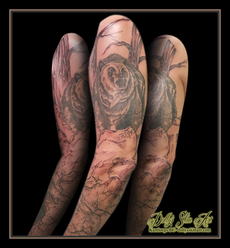 black and grey full sleeve bear trees rocks sand scorpion memorial tribute shoulder forearm elbow tattoo kamloops tattoo dolly's skin art