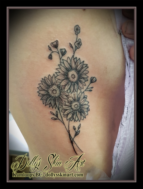 bouquet of daisies black daisy shaded rib tattoo kamloops dolly's skin art