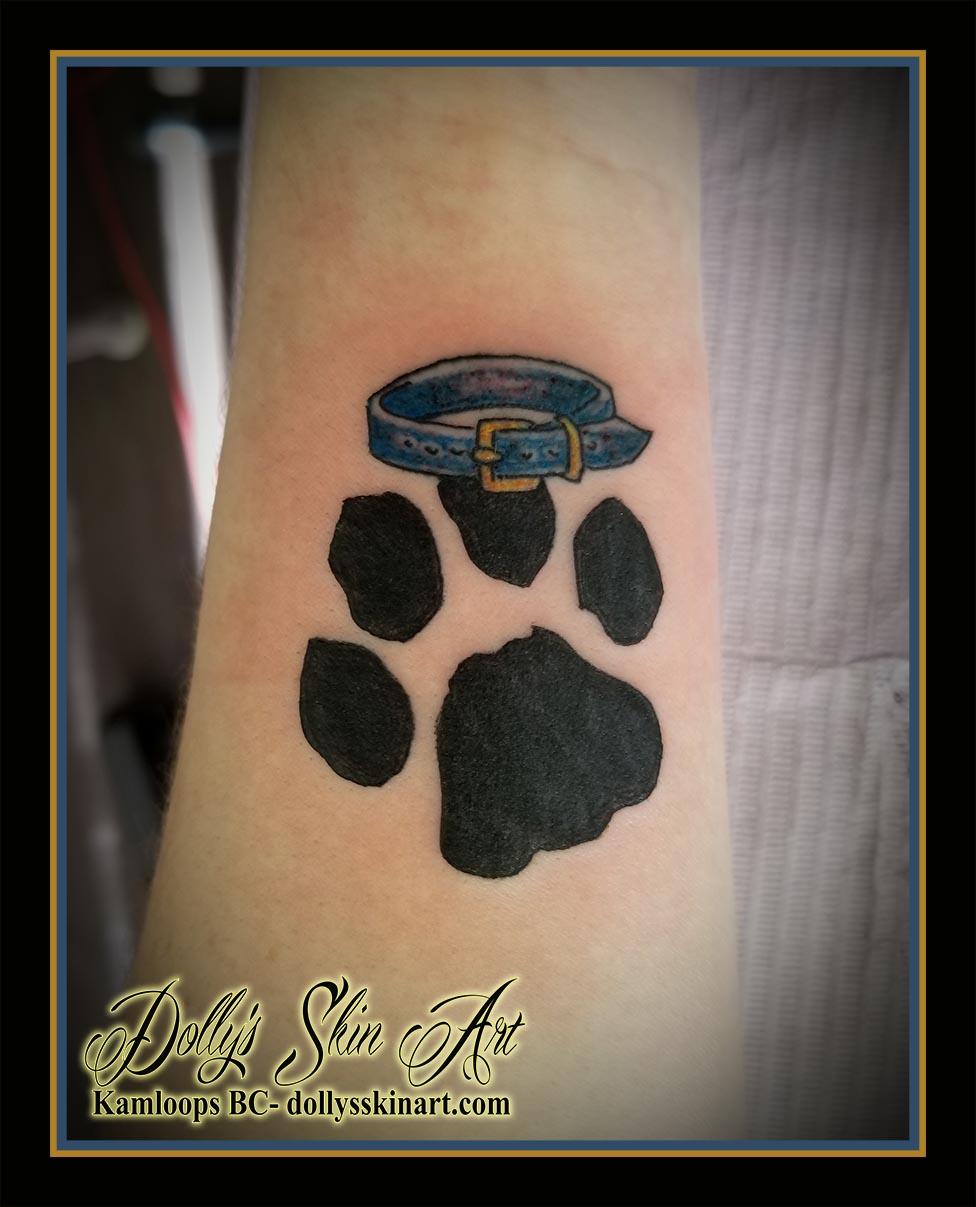 black dog paw print blue collar tribute memorial forearm solid tattoo kamloops dolly's skin art