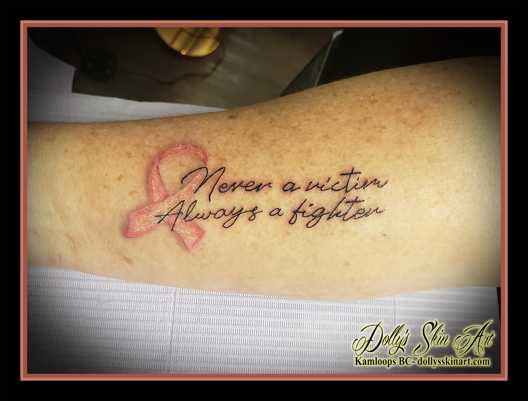 never a victim always a fighter tattoo breast cancer pink ribbon black lettering tattoo kamloops dolly's skin art