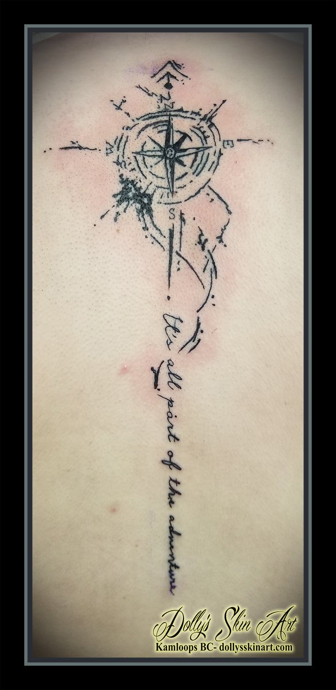 compass tattoo black watercolour style spine back lettering font script It's all part of the adventure tattoo kamloops dolly's skin art