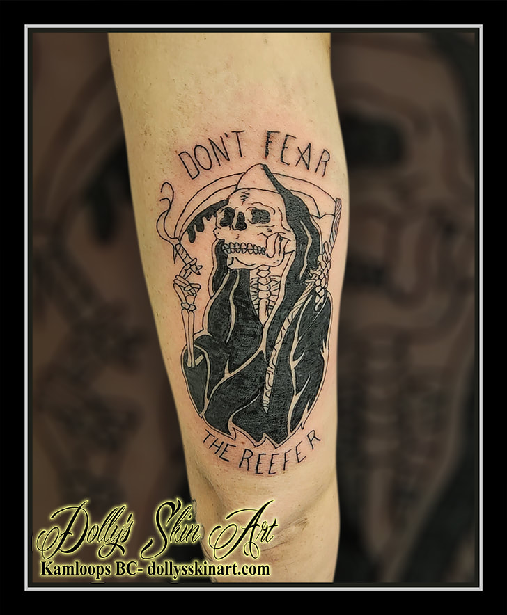 dont fear the reefer tattoo black and grey reaper traditional arm lettering tattoo kamloops dolly's skin art