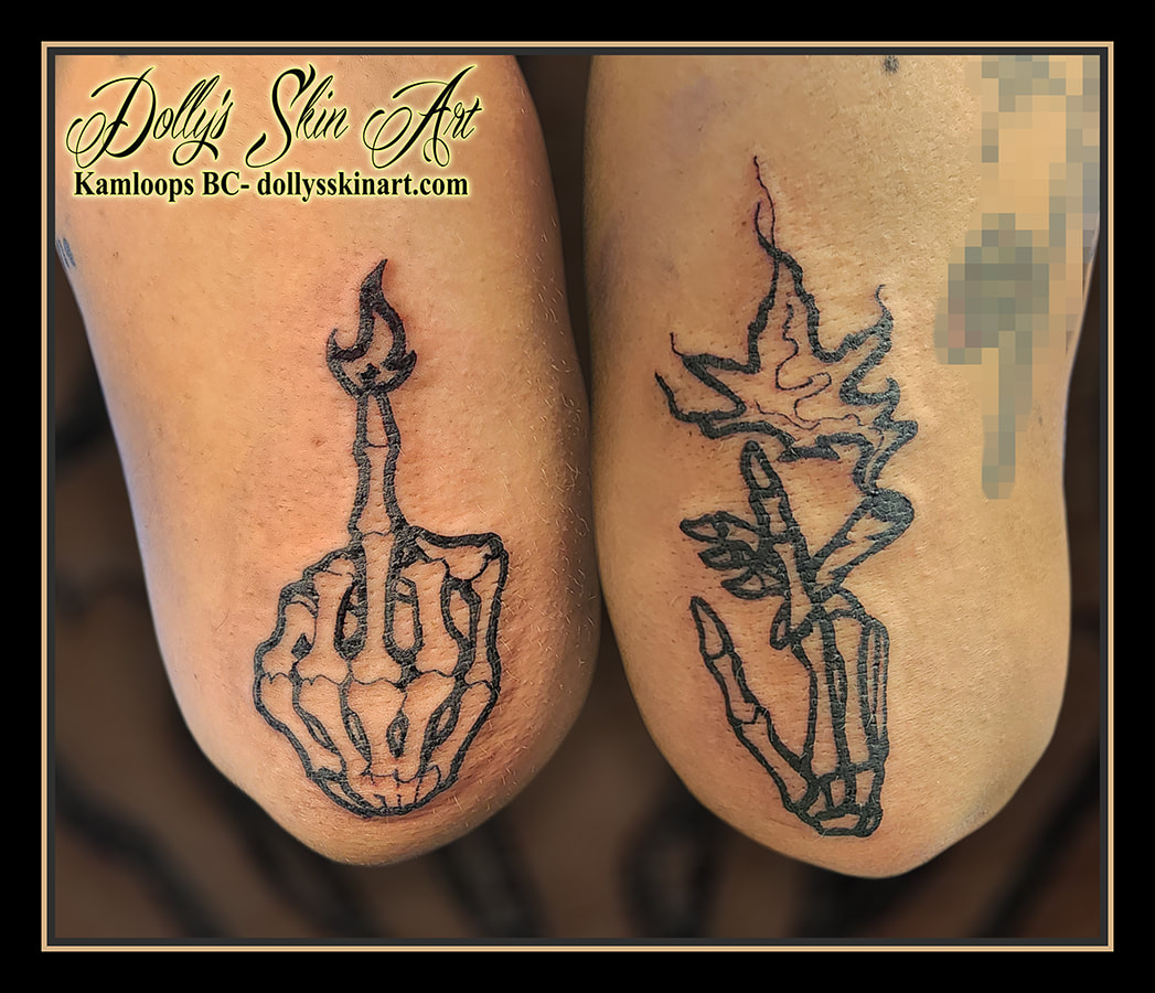 skeleton hand tattoo middle finger flame fire smoking rolled cigarette holding black tattoo kamloops dolly's skin art