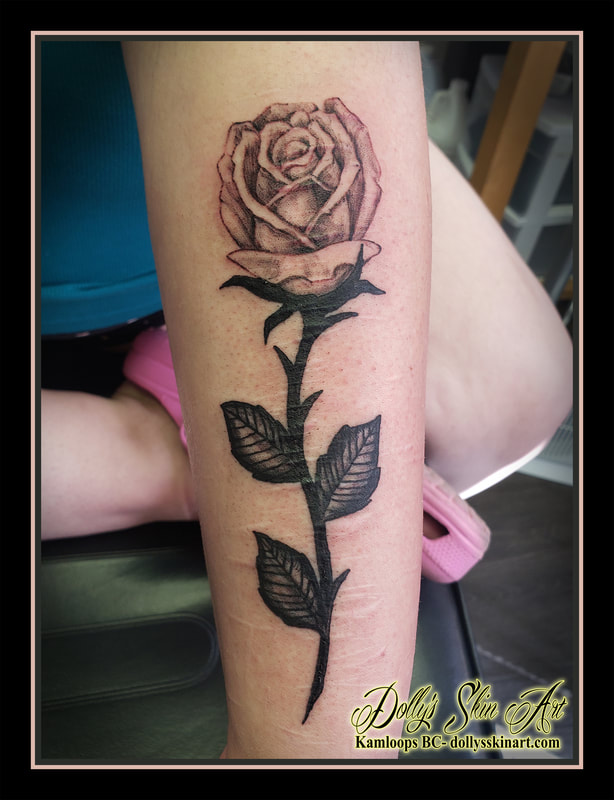 rose tattoo black and grey shading flower forearm tattoo kamloops dolly's skin art