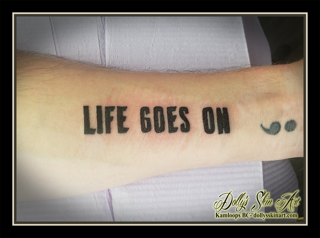 life goes on tattoo black lettering font forearm tattoo kamloops dolly's skin art