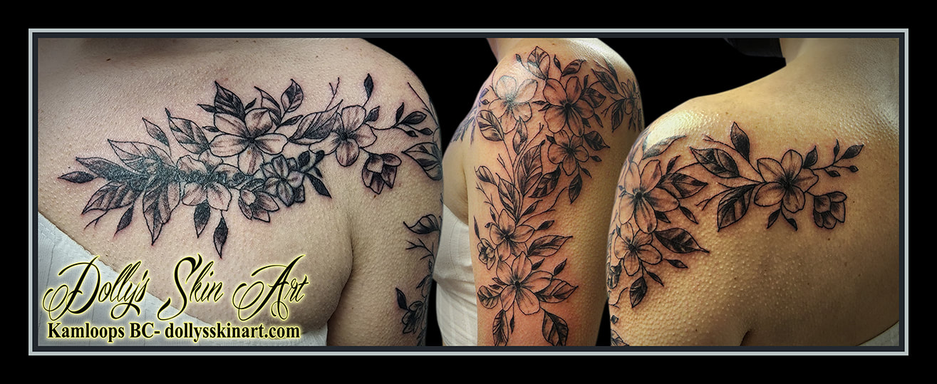 flower tattoo black and grey floral shading leaves petals wrap shoulder chest back tattoo kamloops dolly's skin art