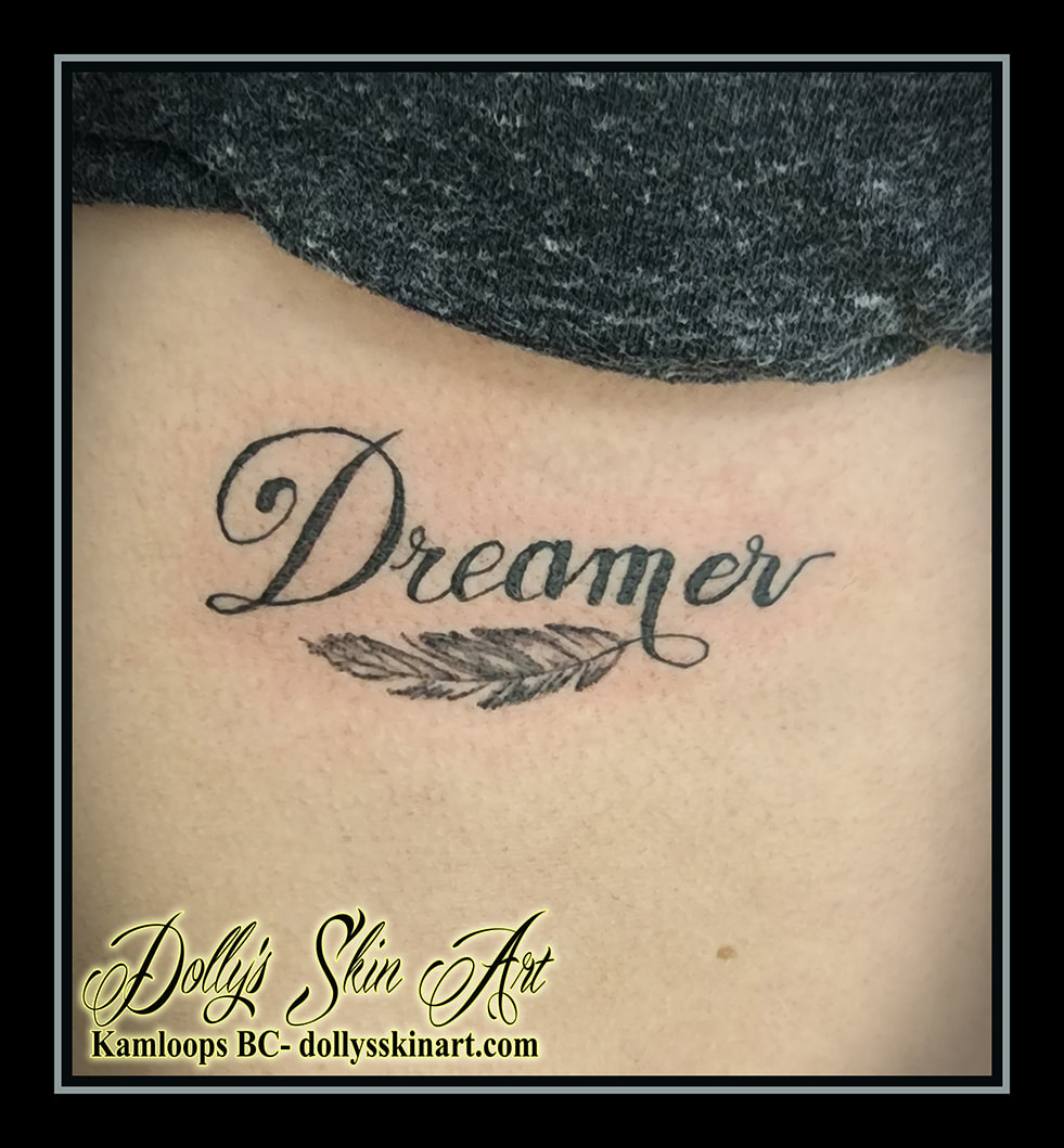 dreamer tattoo feather small black lettering script font shading tattoo dolly's skin art kamloops british columbia
