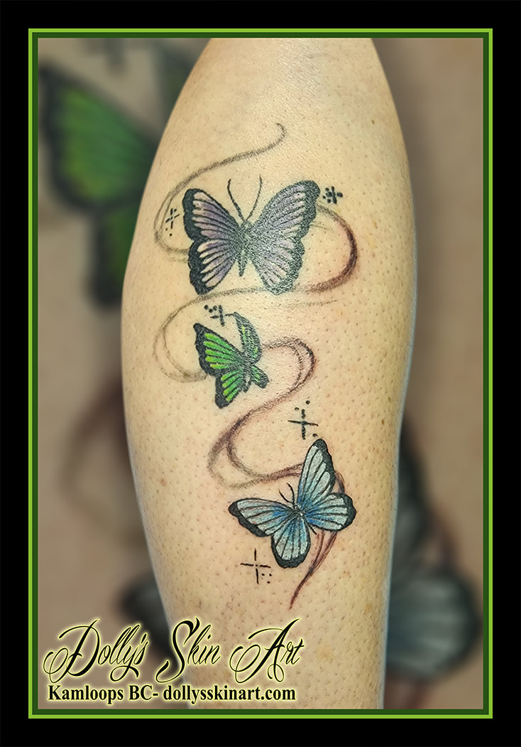 butterfly tattoo butterflies leg colour purple green belue white black shading tattoo dolly's skin art kamloops british columbia