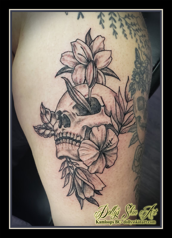 skull flowers tattoo black and grey floral tattoo kamloops dolly's skin art