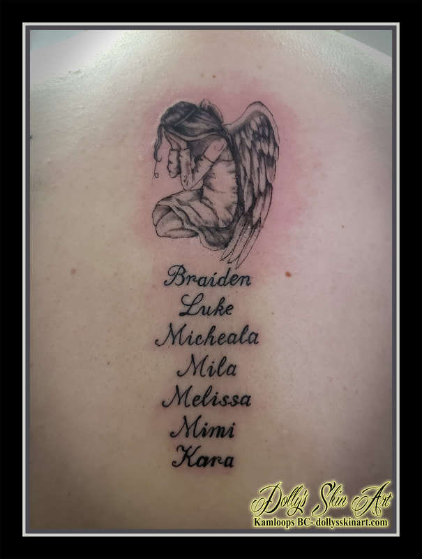angel memorial tattoo black and grey shading names children lettering script font back tattoo kamloops dolly's skin art