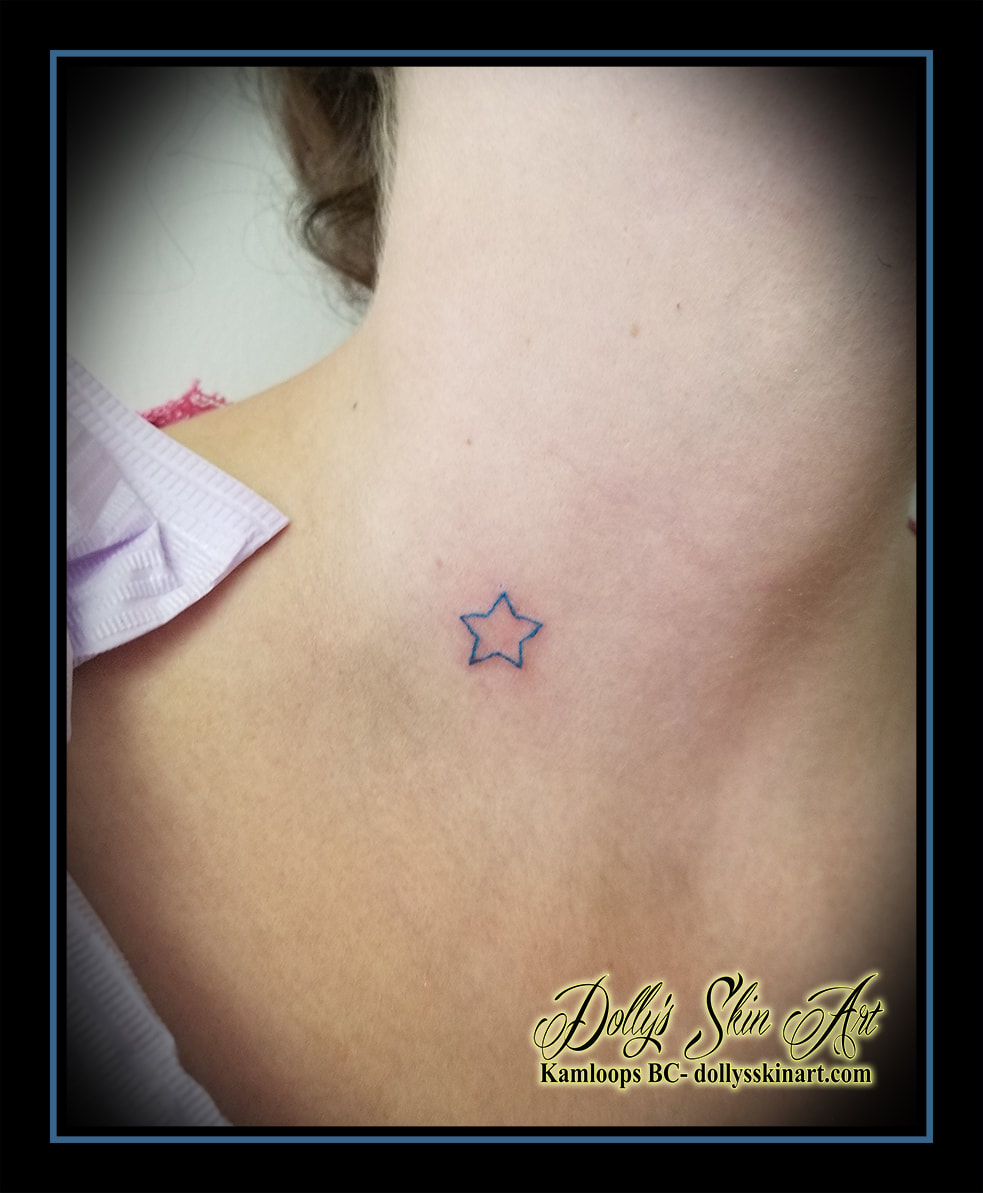 wishing star small blue outline linework tiny collarbone tattoo kamloops tattoo dolly's skin art
