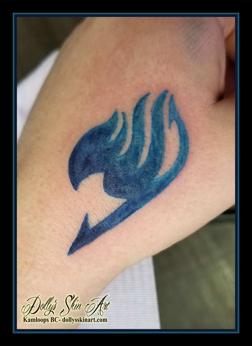 fairy tail logo tattoo symbol blue hand anime tattoo kamloops dolly's skin art