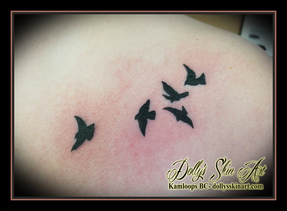 small black birds silhouette solid collarbone five tattoo kamloops tattoo dolly's skin art