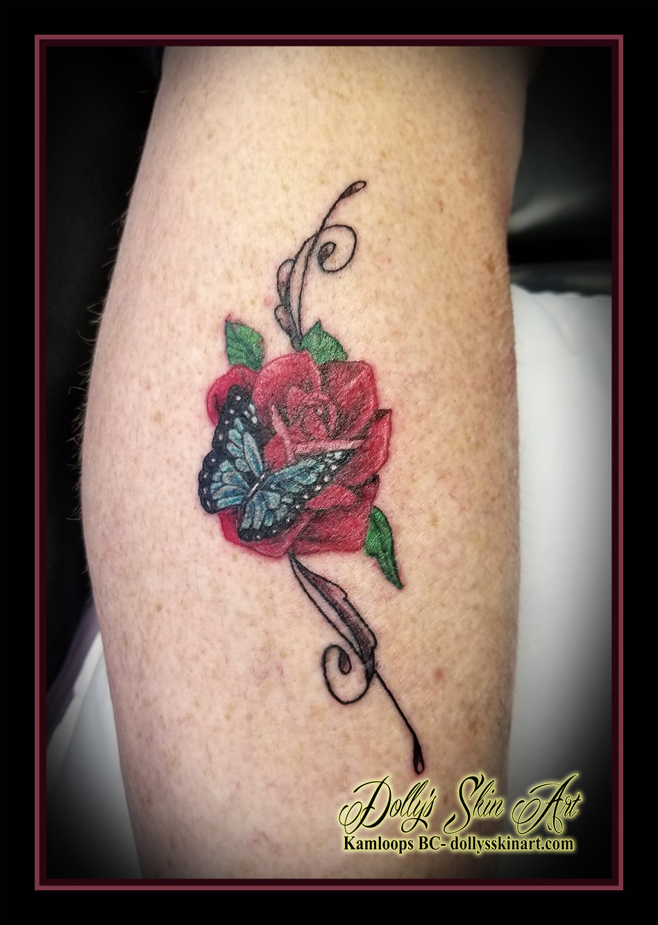 butterfly rose tattoo colour flower filigree blue white red green black leg calf tattoo kamloops dolly's skin art