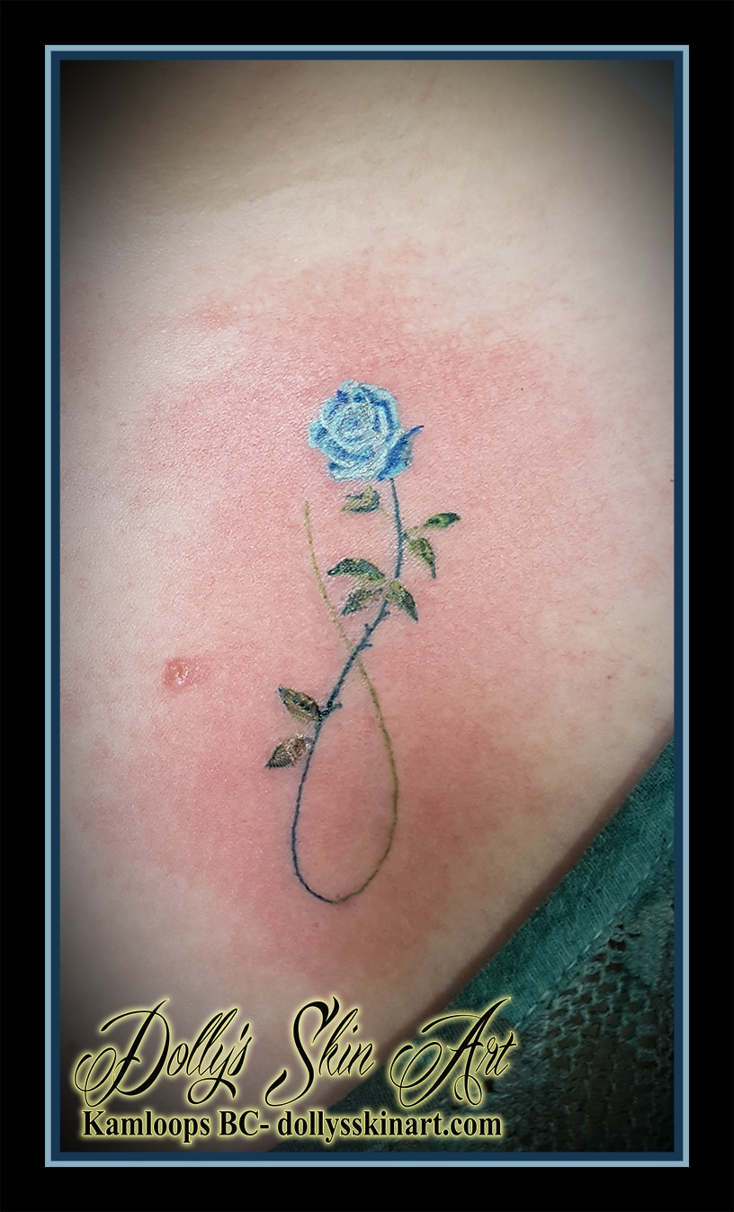 small tiny blue green infinit rose tattoo colour kamloops dolly's skin art