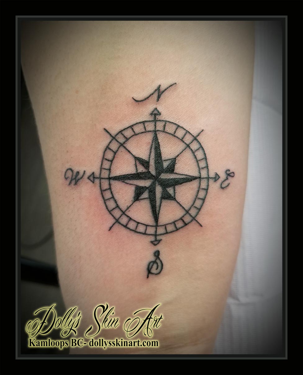 small black thin compass lettering font n s w e direction linework tattoo kamloops dolly's skin art