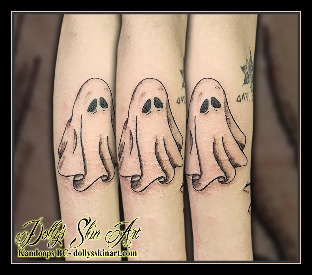ghost tattoo black linework arm tattoo kamloops dolly's skin art