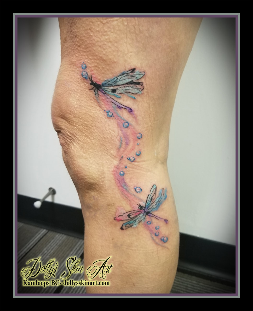 dragonfly tattoo dragonflies water colour leg pink blue black white bubbles tattoo kamloops dolly's skin art