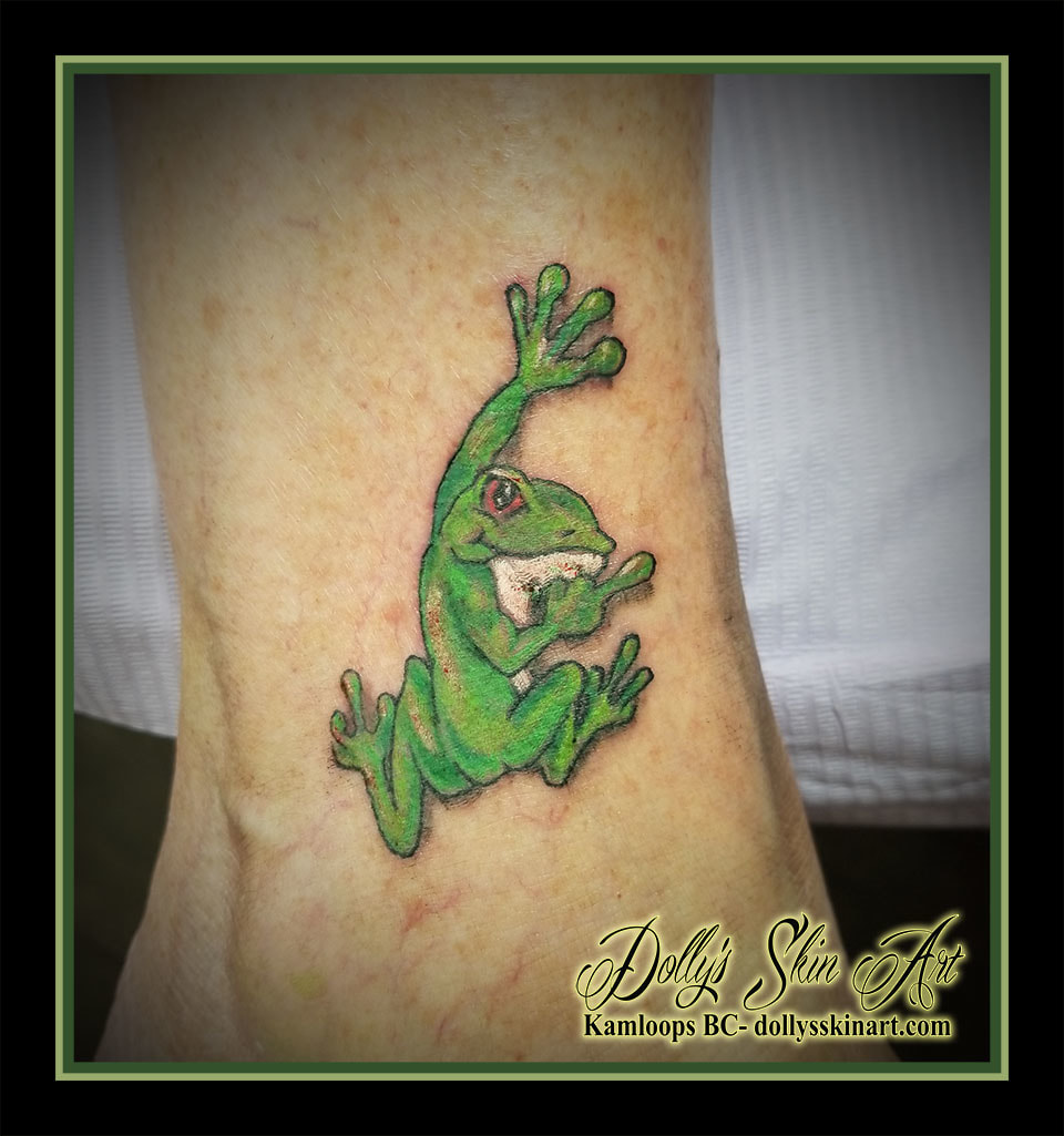 green colour frog middle finger white ankle sassy tattoo kamloops dolly's skin art
