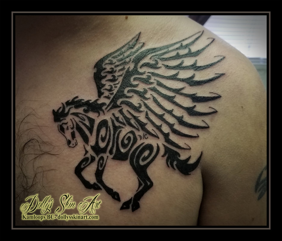 spirit horse tattoo pegasus tribal black chest wings tattoo kamloops dolly's skin art