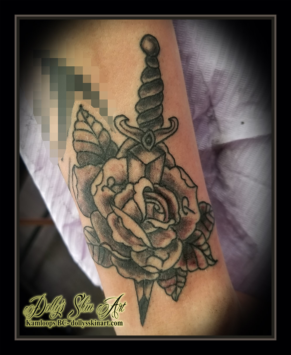 rose dagger tattoo black and grey tradtional style shading memorial arm tattoo kamloops dolly's skin art