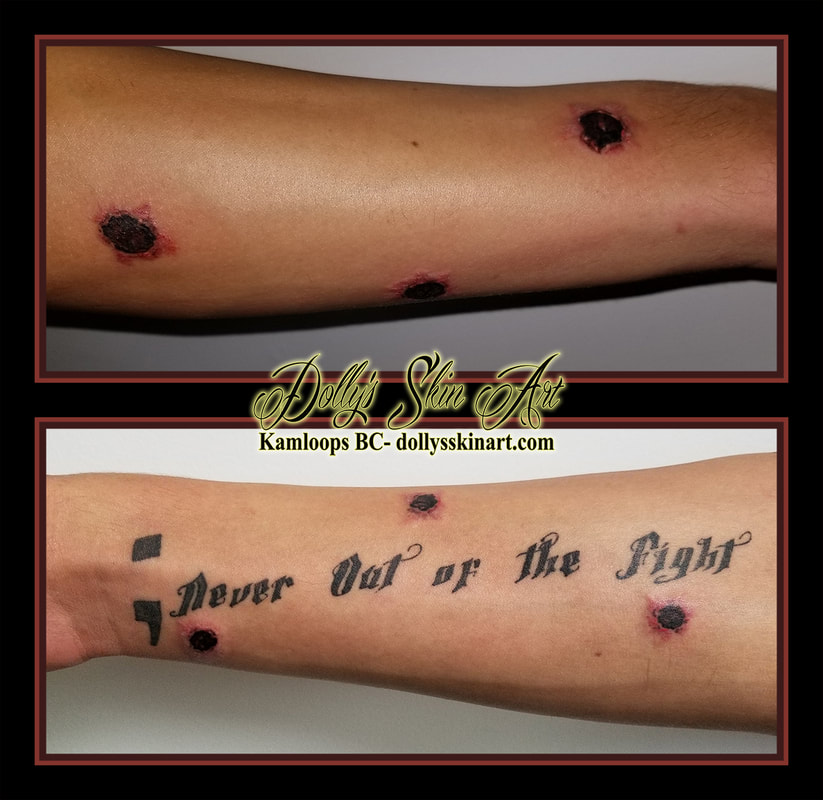 colour bullet wound entrance exit realism blood healed forearm never out of the fight semi colon red black tattoo kamloops dolly's skin art