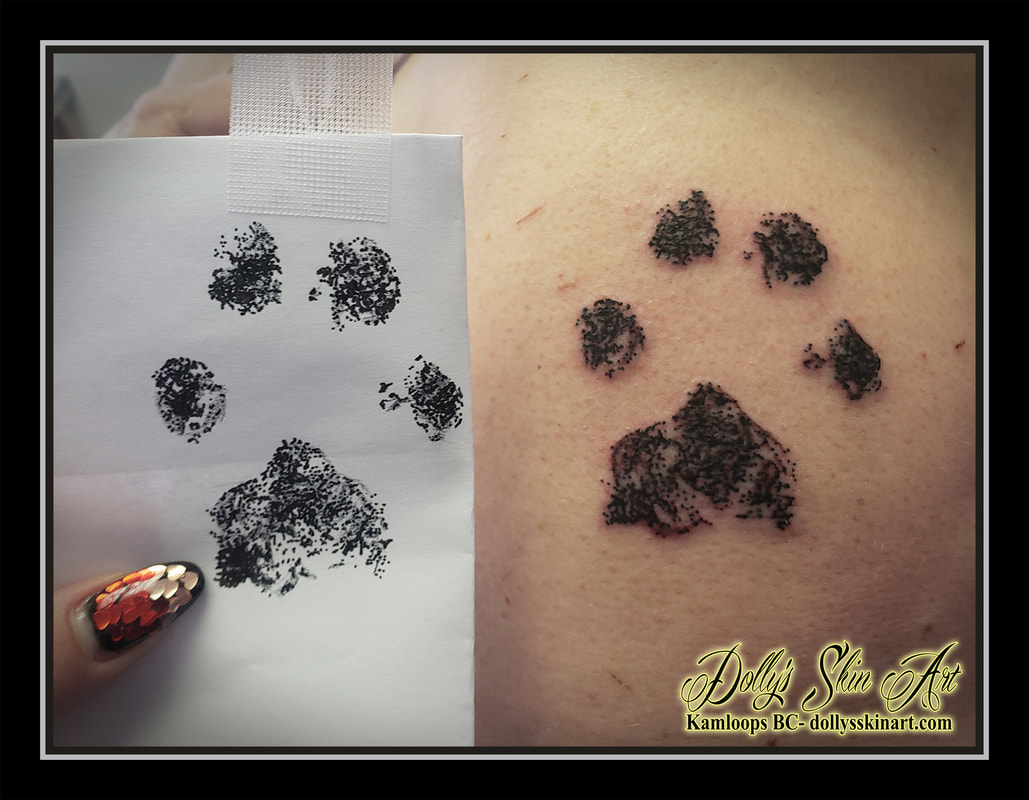 paw print tattoo dog pawprint black and grey ink tattoo kamloops dolly's skin art