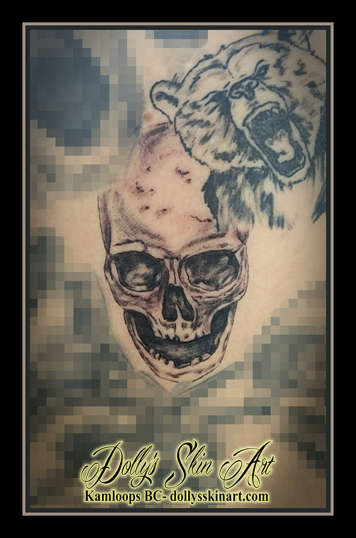 skull tattoo black and grey shading back tattoo dolly's skin art kamloops
