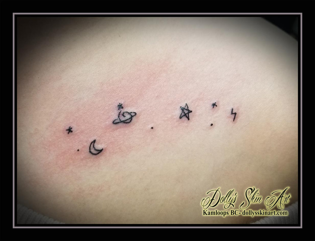 small star system tattoo linework moon ring planet stars black tattoo kamloops dolly's skin art