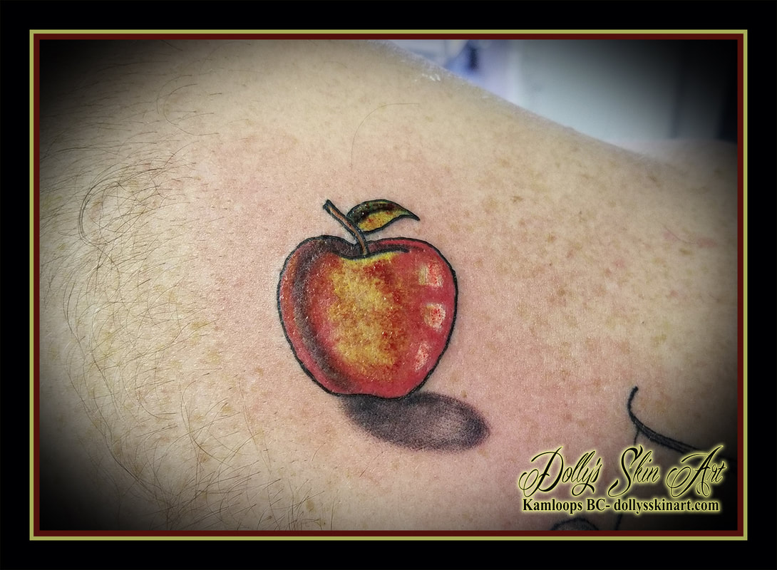 apple red yellow small colour fruit back tattoo kamloops tattoo dolly's skin art