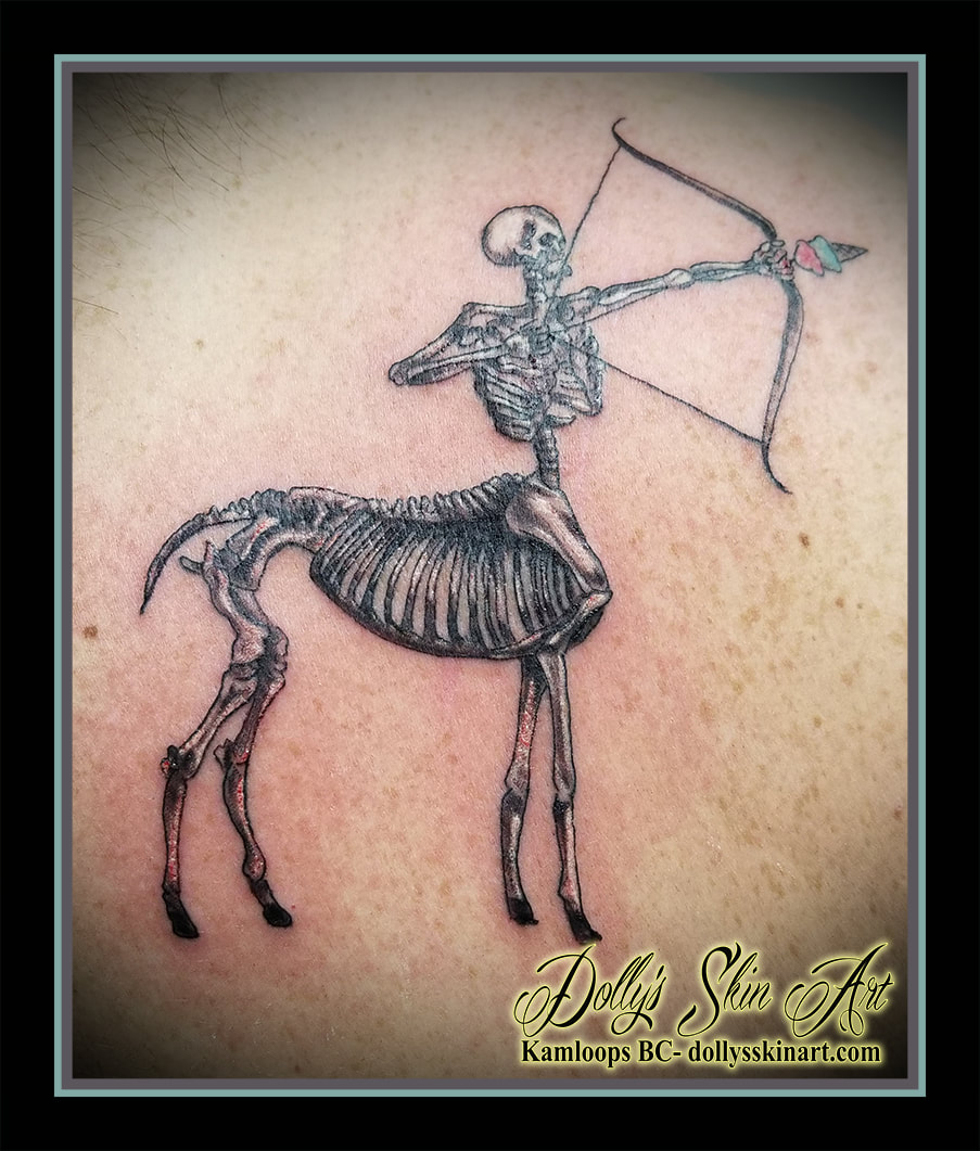 centaur skeleton black and grey white archer bow arrow ice cream cone pink blue tattoo kamloops tattoo dolly's skin art