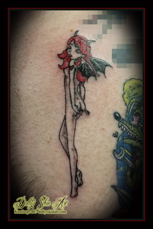 devil girl tattoo traditional black and grey red small tattoo kamloops dolly's skin art