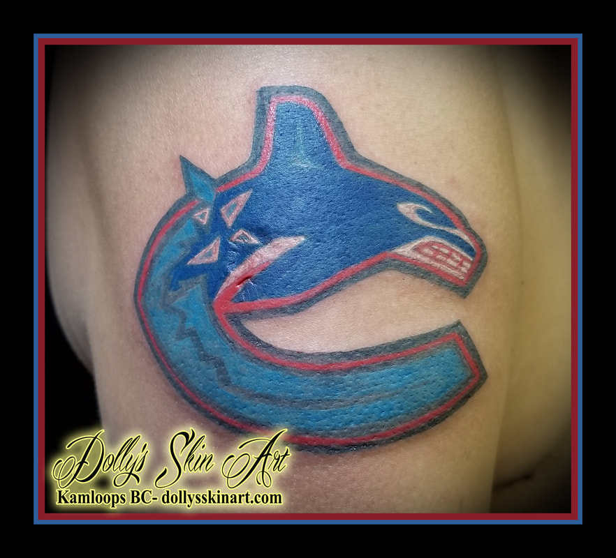 Vancouver Canucks hockey nhl colour logo whale arm scar cover up blue red white grey bicep arm tattoo kamloops dolly's skin art